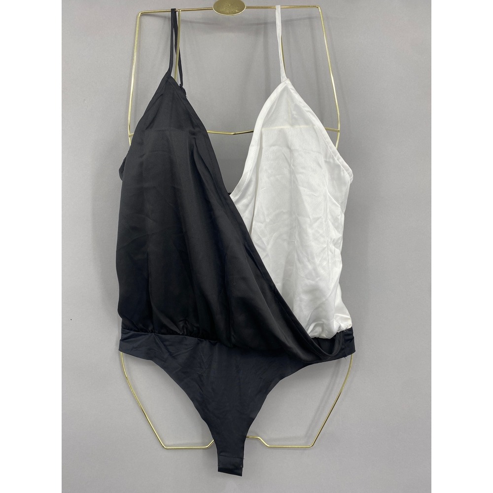Strut & Bolt Bodysuit Women Large Black White Colorblock Surplice Wrap
Cruella